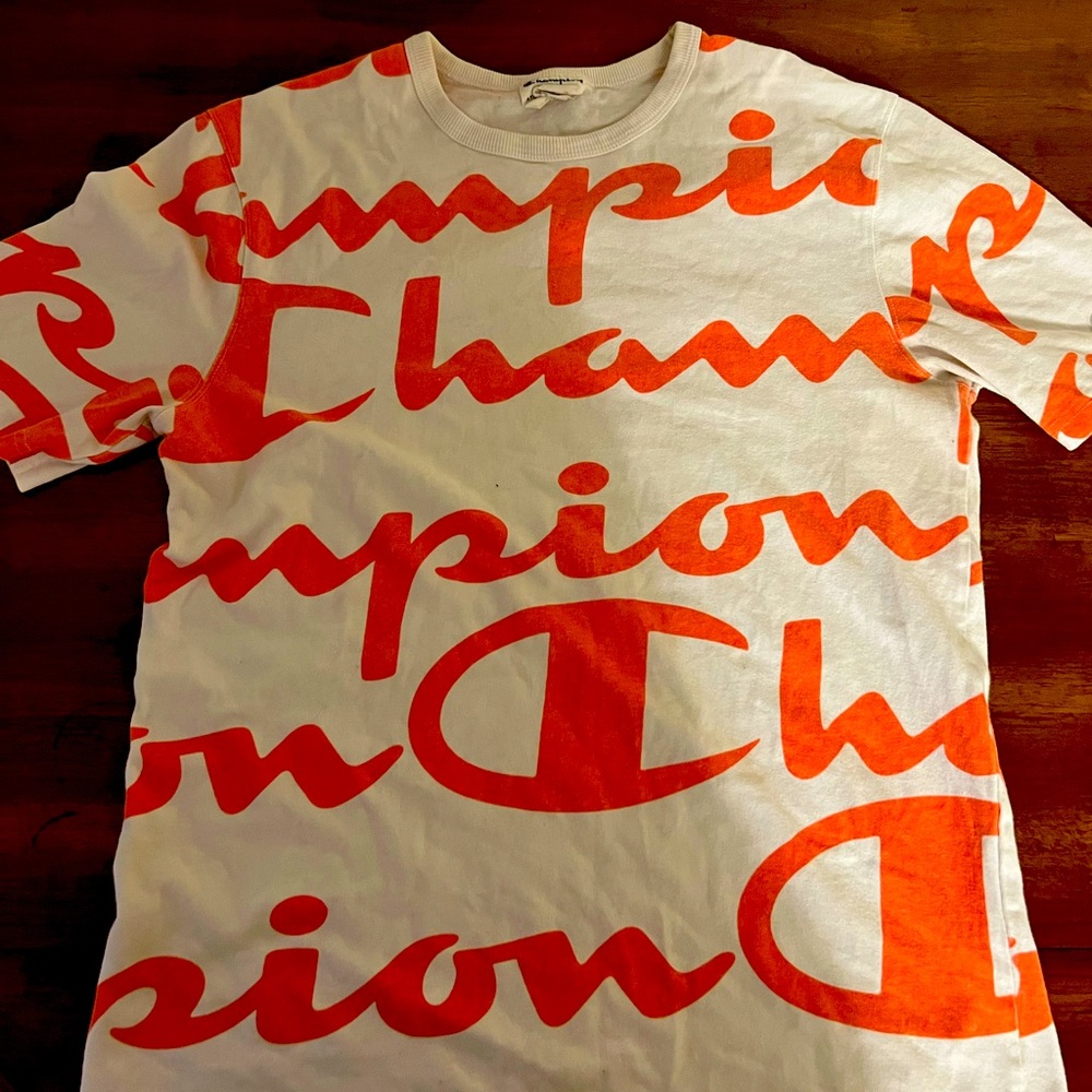 Champion Tee